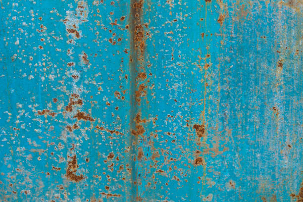 茶色または赤い金属の錆のグランジは、青い背景のテクスチャに。錆びた、古い、ヴィンテージ、茶色の金属や鉄板の表面にレトロな背景のテクスチャ。 - rust rusty old rotting ストックフォトと画像