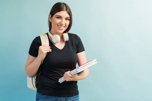 istock Young Caucasian Woman Standing Against Plain Background 1181930552