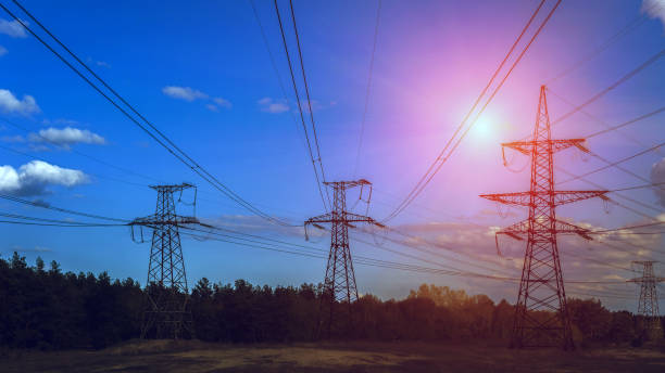 istock high-voltage  power lines at sunset. electricity distribution station. high voltage electric transmission tower. 1181932417