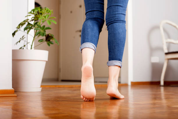 istock feet in home 1181933816