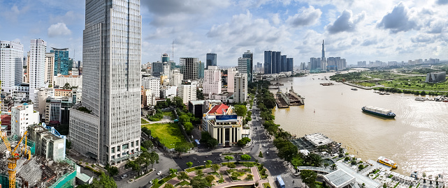 Aerial Wide Shot of Downtown Ho Chi Minh City (Saigon) and Saigon River on a Clear Summer Day - Saigon, Vietnam