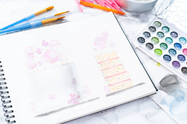 istock Baker is designing a birthday cake for 1181944601