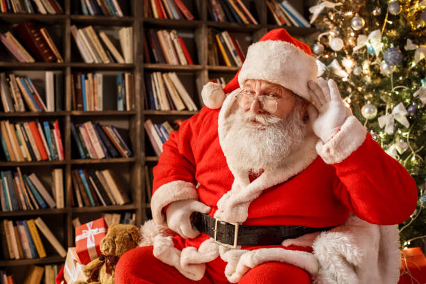 Santa Claus in the library christmas new year concept stock photo