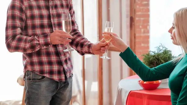 Photo of romantic winter holiday celebration champagne