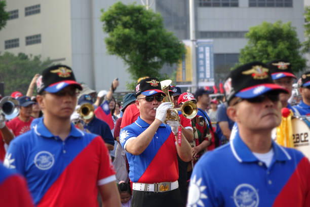 Trumpets of a town band during a performance.