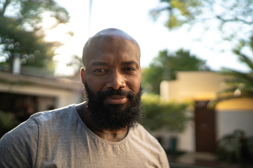 Portrait of mid adult man at home