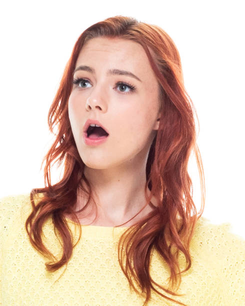 One person / headshot / portrait of 18-19 years old beautiful redhead caucasian young women teenage girls in front of white background wearing jeans who is inspiration / day dreaming / imagination / aspirations / contemplating who is sweating una persona / foto de la cabeza / retrato de 18-19 años hermosa pelirroja mujeres jóvenes adolescentes chicas frente a fondo blanco usando jeans que es inspiración / día de sueño / imaginación / aspiraciones / contemplando quién está sudando