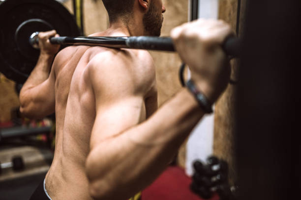 istock Shirtless Weight lifting 1181966917
