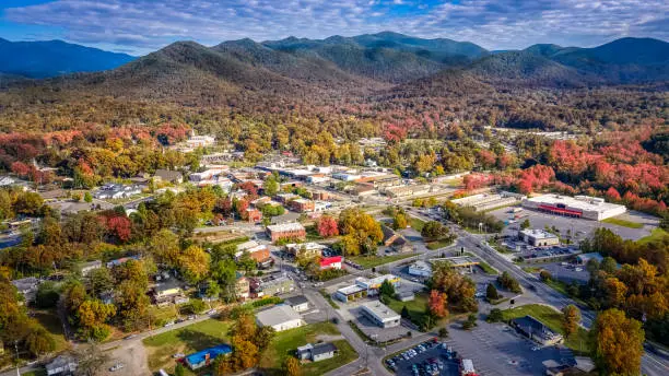 Photo of Aerial view picturesque Asheville neighborhood during the Fall with colors starting to show