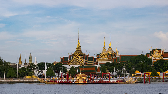 Bangkok, Thailand- October 17,2019 : Thai royal barge rehearsal in Chaophraya river ,Bangkok, Thailand with the royal palace as background. Date 17 October 2019.