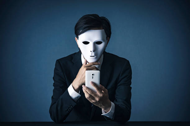 istock Businessman with a white mask 1181982688