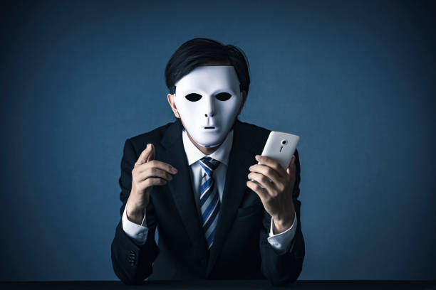 istock Businessman with a white mask 1181982693