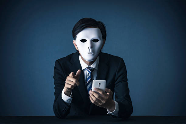istock Businessman with a white mask 1181982695