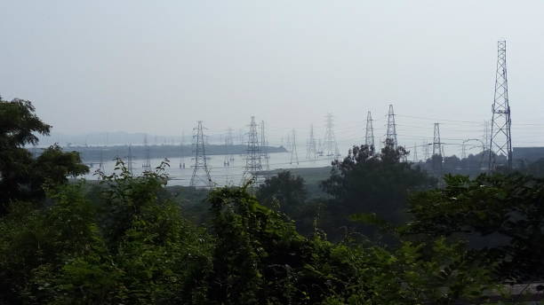 istock Electric transmission lines, aerial view. 1181984611