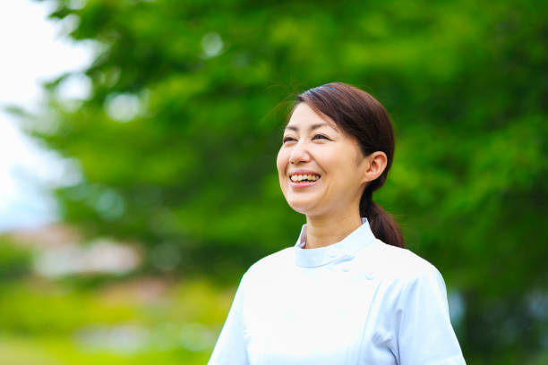 istock A nurse woman in a refreshing green 1181984750