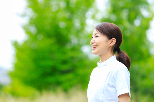 istock A nurse woman in a refreshing green 1181984759