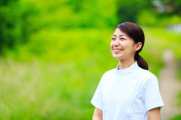 istock A nurse woman in a refreshing green 1181984764