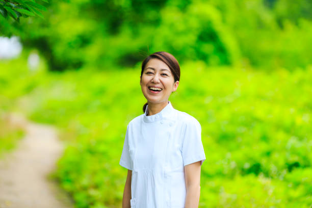 istock A nurse woman in a refreshing green 1181985357