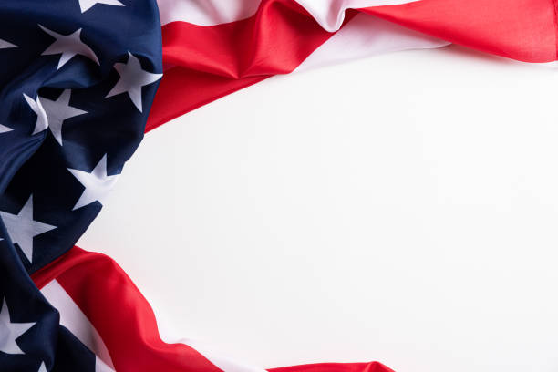 istock Happy Veterans Day. American flags against a white background. 1181987882