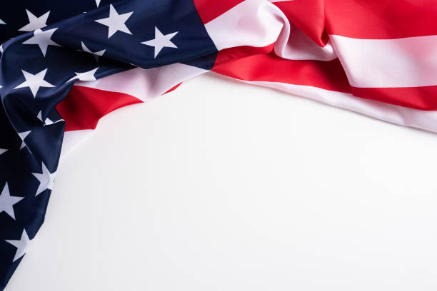 istock Happy Veterans Day. American flags against a white background. 1181987968