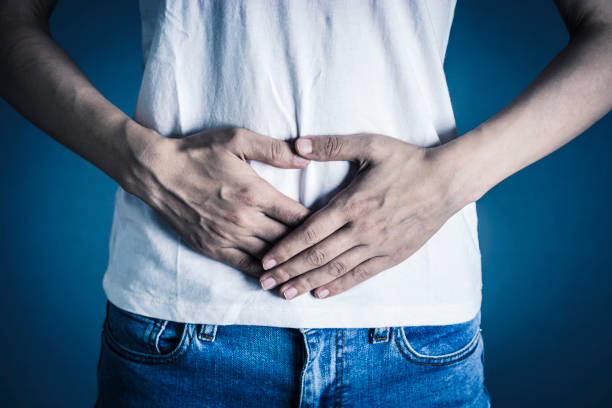 istock Woman who hurts her stomach 1181988355
