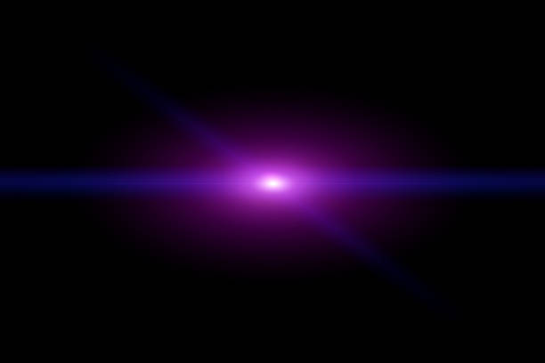 istock abstract lens flare light over black background 1181990928