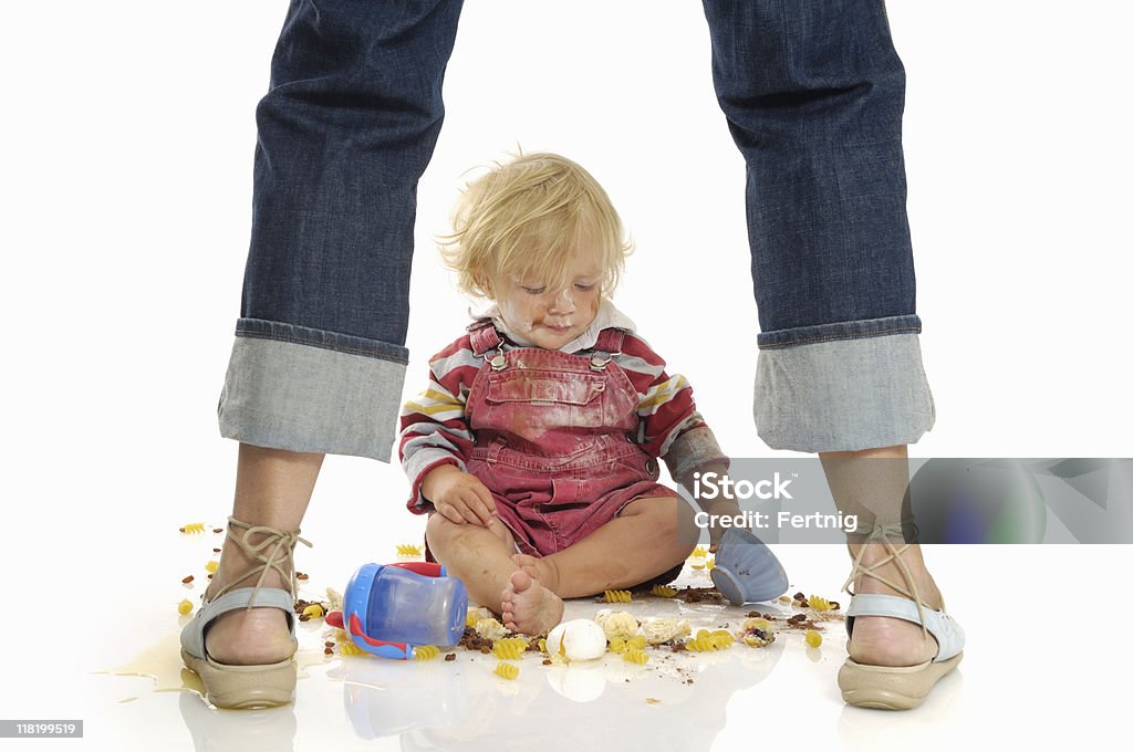 Toddler making a mess on the floor  Chaos Stock Photo