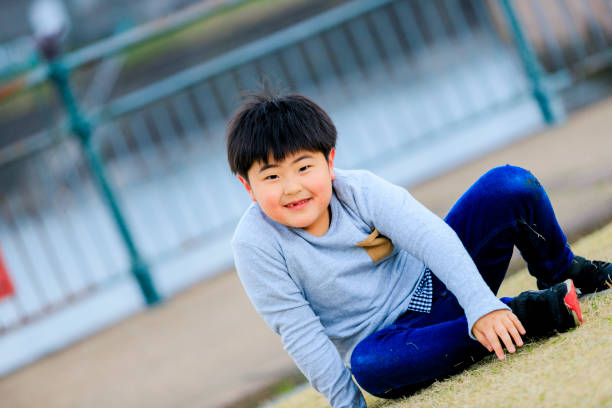 istock Japanese boy playing outside 1182001709