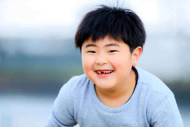 istock Japanese boy playing outside 1182001759