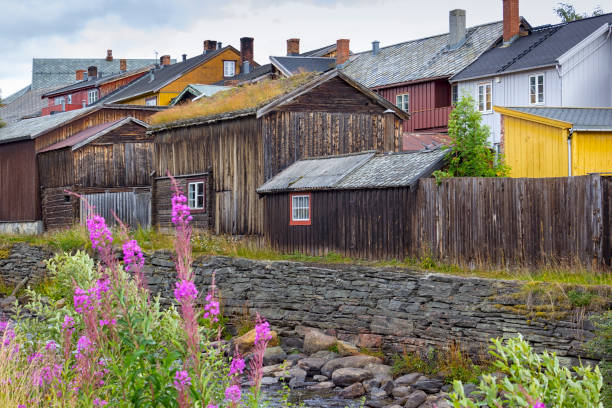 The mining town of Roros is sometimes called Bergstaden which means mountain town The mining town of Roros is sometimes called Bergstaden which means mountain town due to its historical notoriety for copper mining. It is one of two towns in Norway that were historically designated mining towns. Roros has about 80 wooden houses, most of them standing around courtyards, giving the town a medieval appearance. roros mining city stock pictures, royalty-free photos & images