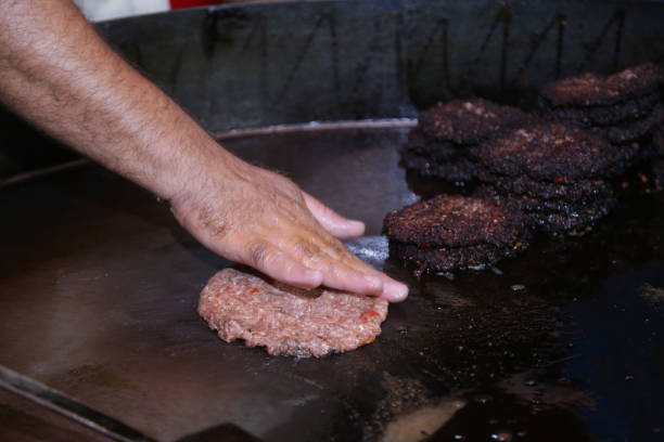 istock Chef Frying Kebab in Hot Oil 1182008398