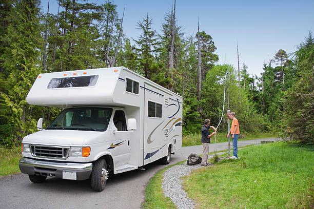 a recreational vehicle is positioned on the roadside