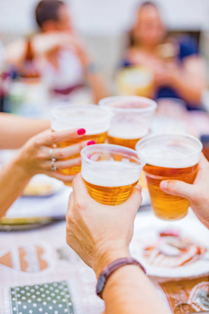 istock Friends enjoying drinking beer in the backyard. 1182011536