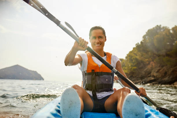 istock Woman kayaking on river during summer 1182011569