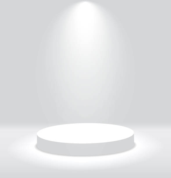 istock White 3d round podium with light and lamp. Winner stand with spotlights. Empty pedestal platform for award. Podium, stage pedestal or platform illuminated by light on isolated background. vector 1182012379