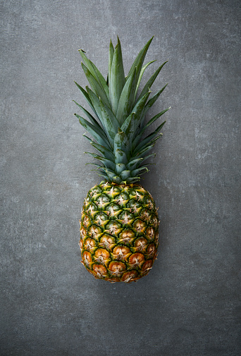 a Pineapple on concrete surface