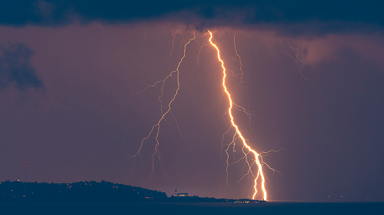 Lightning bolt hitting north Adriatic sea (Europe) near Piran (Slovenia).