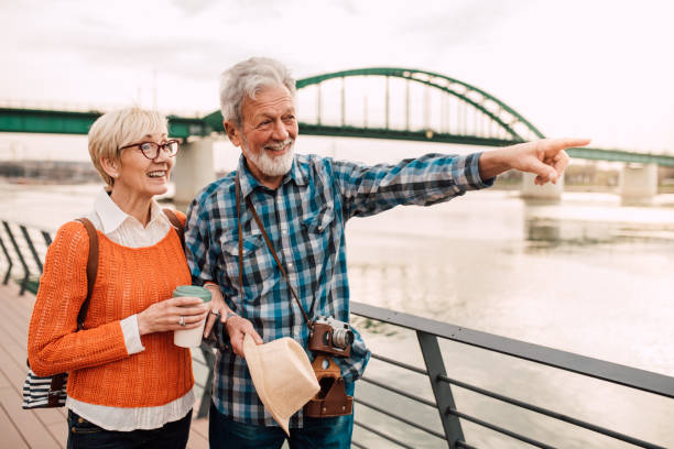 istock Happy seniors enjoying by the river 1182016024