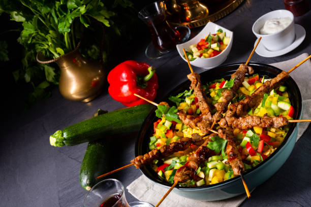 istock Lamb skewers with curry rice and different vegetables 1182018388