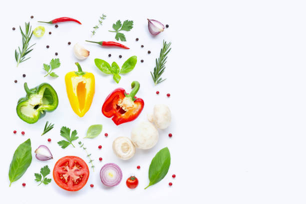istock Various fresh vegetables and herbs on white background. Healthy eating concept 1182018714