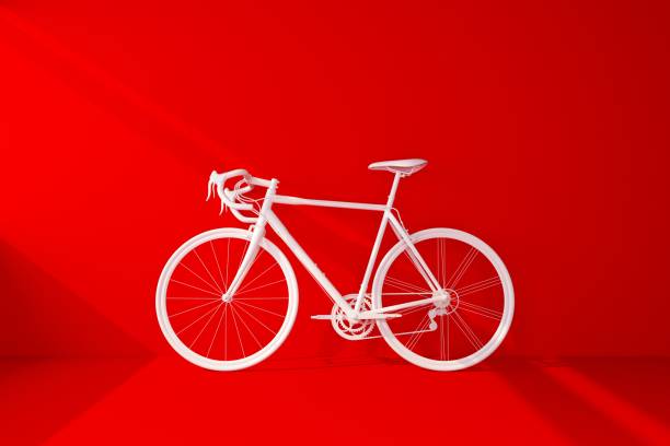 istock white bike on red wall 1182019470