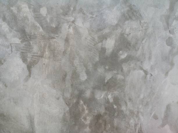 istock cement wall gray color Plaster bare polished surface texture concrete material background detail architect construction 1182025785