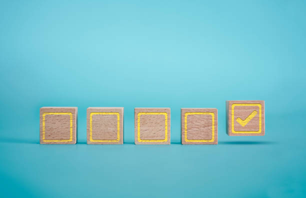 istock Checklist on the Blue Background with Wooden Block 1182026336