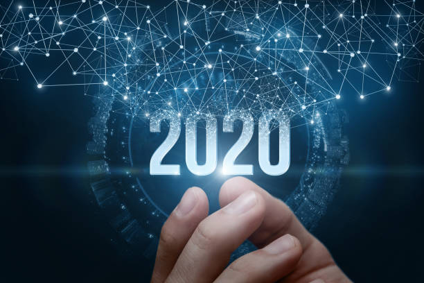 istock The hand shows the numbers 2020 on a dark background. 1182027742