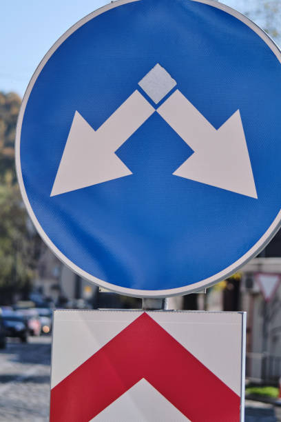 istock Blue sign with two white arrows that indicate left and right. 1182027820