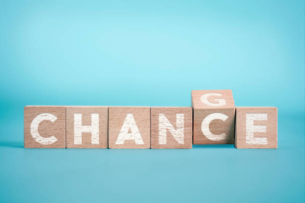 istock Chance to Change on the Blue Background wiith Wooden Cube 1182028815