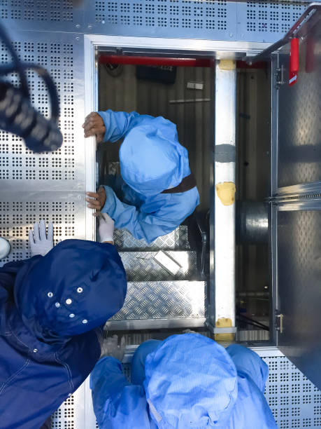 vendor working at raised floor at clean room