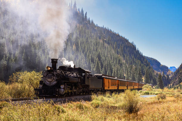 istock Vintage Steam Train With Autumn Scenery Background. 1182031127