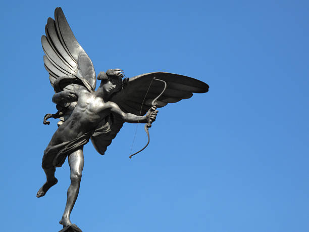 The aluminium statue of Eros the greek mythological  God Of Love, stands at the top of The Shaftesbury Memorial Fountain in London's Piccadilly Circus