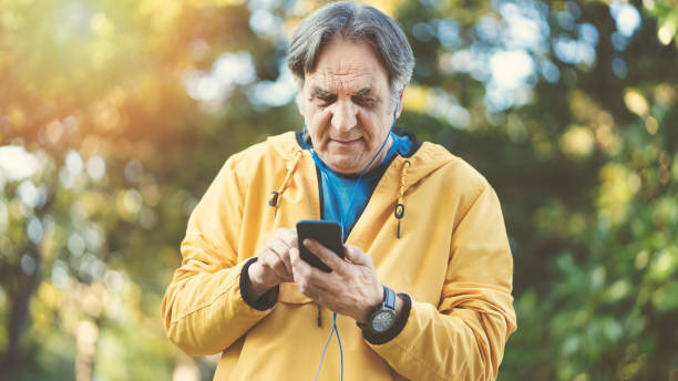 istock Man jogging in the park 1182038514